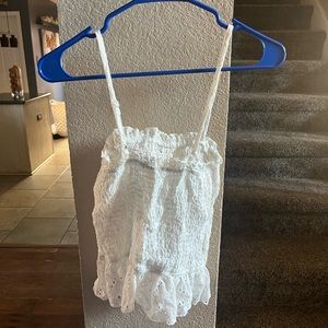 Spaghetti strap tank top with lace detailing